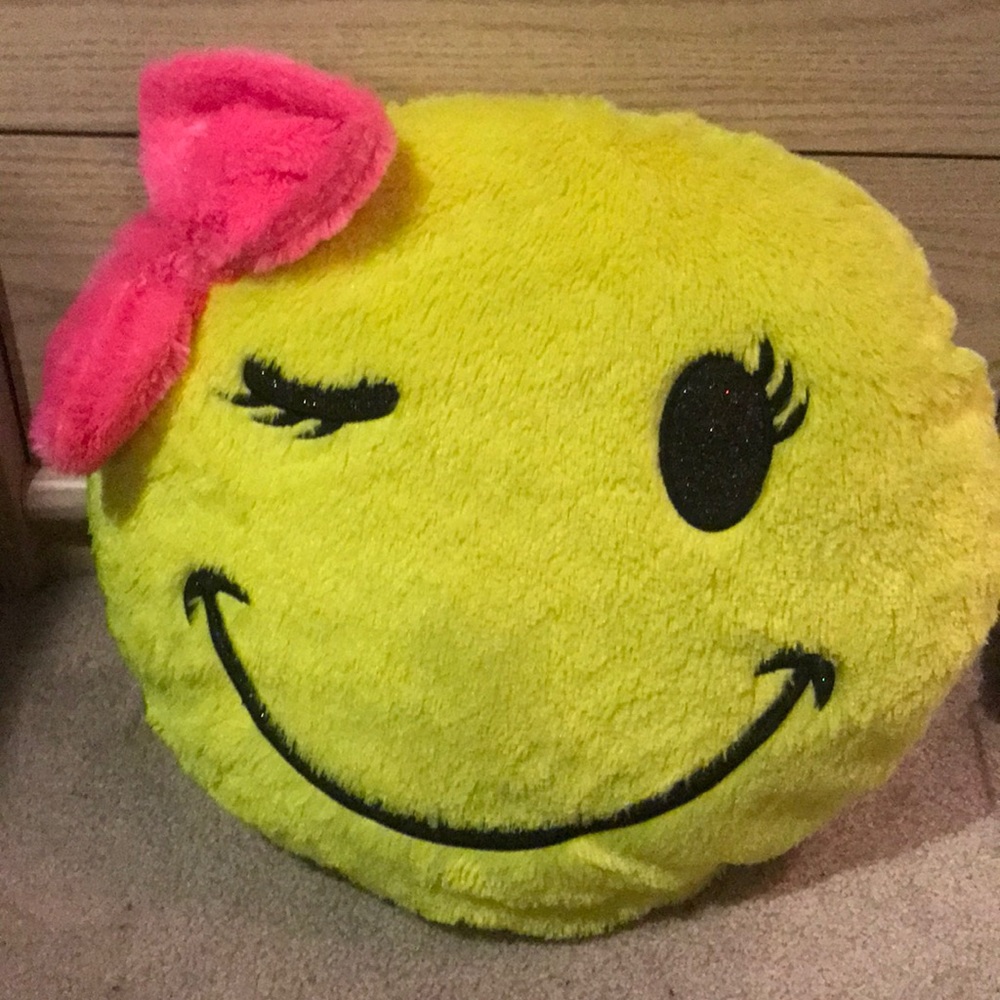 Justice smiley face pillow!